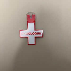 Croix Podologue rouge avec ventouse
